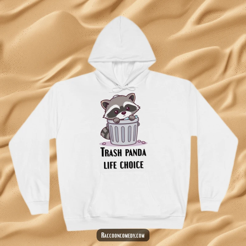 Funny mischievous raccoon trash hoodie showing a raccoon peeking from behind an overflowing trash can, designed for warmth and a touch of playful crime.