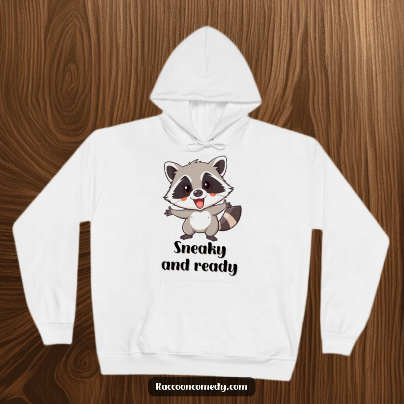 Funny hoodie showcasing an excited raccoon, eyes gleaming, depicted in mid-action, ready for a secret adventure or daring feat.