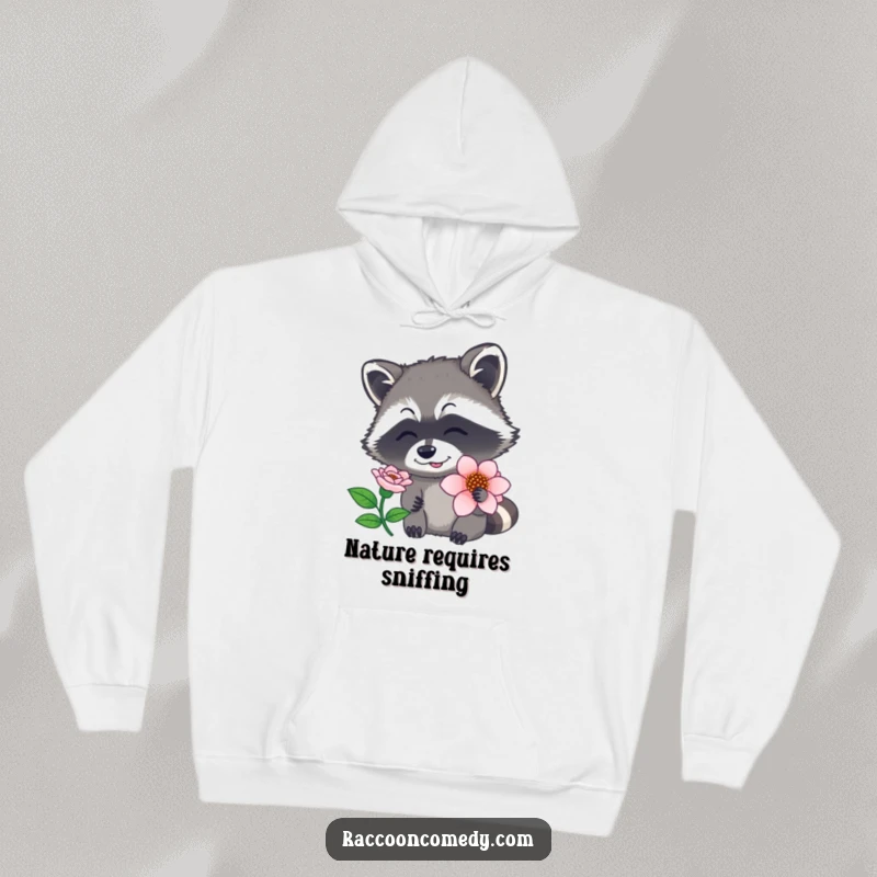 Funny raccoon hoodie depicting a cute raccoon with its nose twitching as it delicately sniffs a fragrant flower, a warm funny gift.