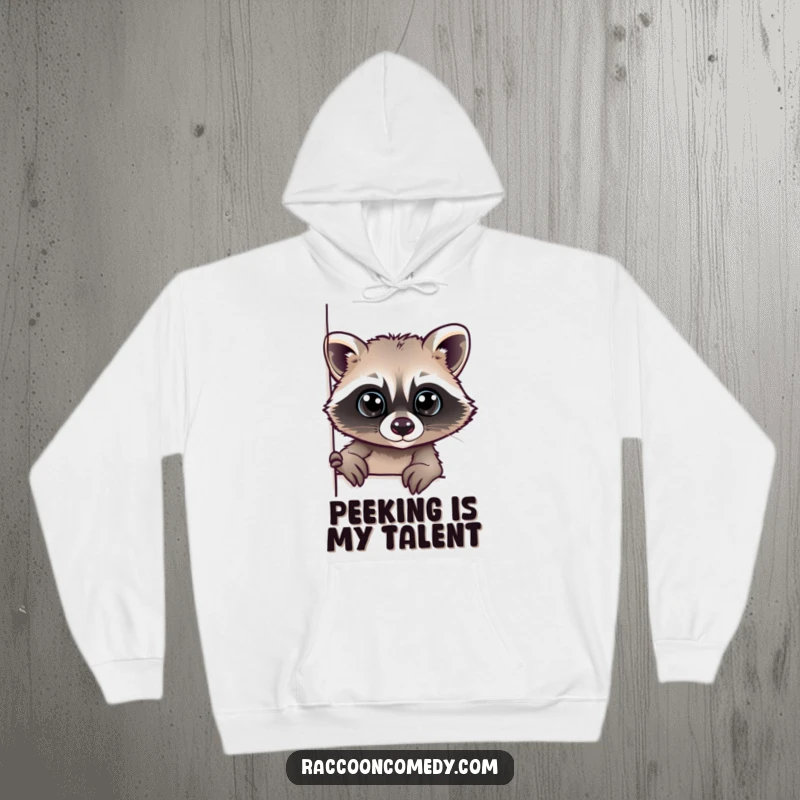 Funny hoodie featuring a raccoon with large, curious eyes peeking from behind a corner, suggesting playful observation.