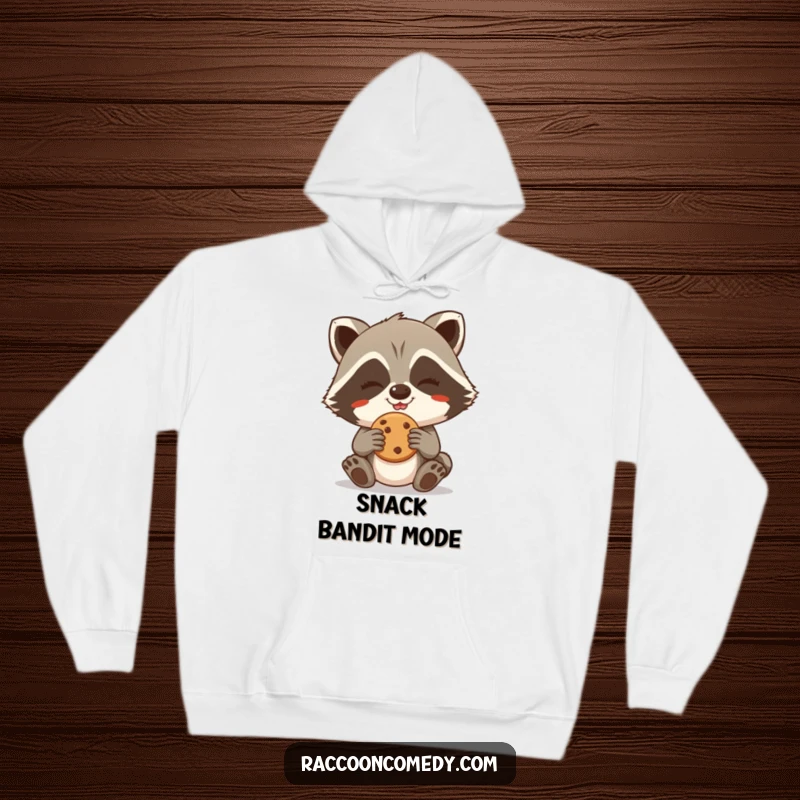 Funny Raccoon Hoodie: A giggling raccoon aims to steal a cookie, mischief radiating from its grinning face.