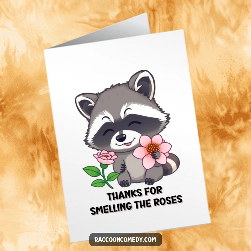 Funny free printable thank you card of a raccoon with its nose twitching, enjoying the fragrance of a blooming flower.