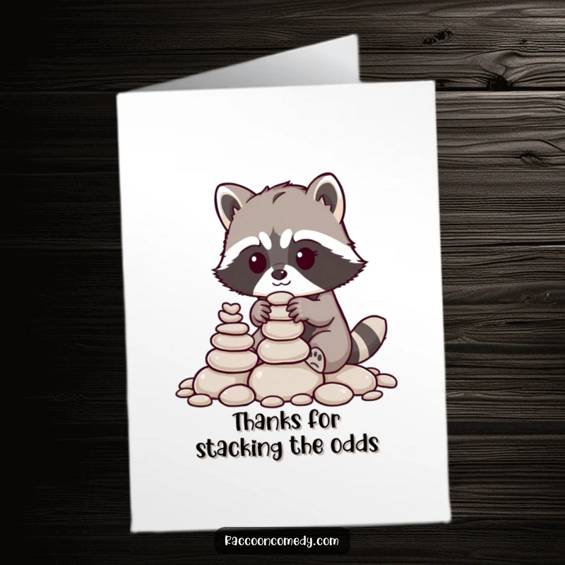 Funny Free Printable Thank You Card: A raccoon skillfully stacks pebbles, offering thanks in a unique way.