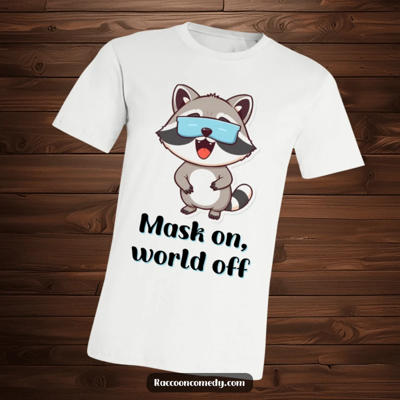 Funny t-shirt with an excited raccoon wearing a mask over its eyes, peeking out with curiosity, perfect for gifting.