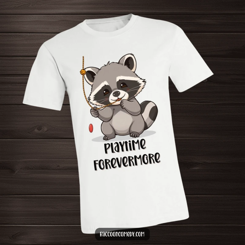 Funny kawaii raccoon t-shirt, playfully batting at a tempting dangling string with adorable focus.