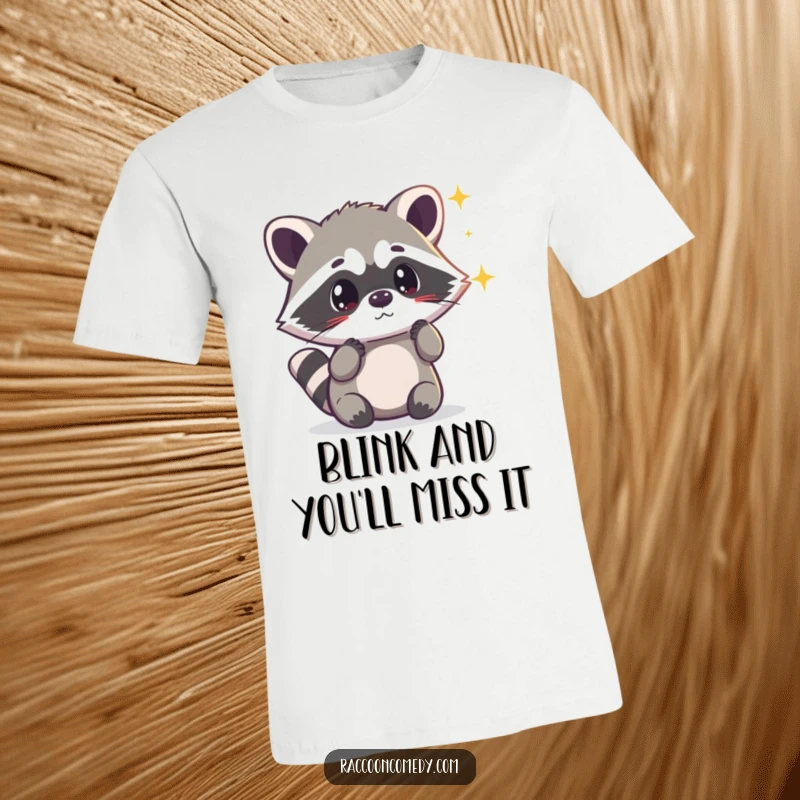 Funny kawaii raccoon looking surprised by a shimmering light, symbolizing wonder and magic, printed on a comfortable t-shirt.
