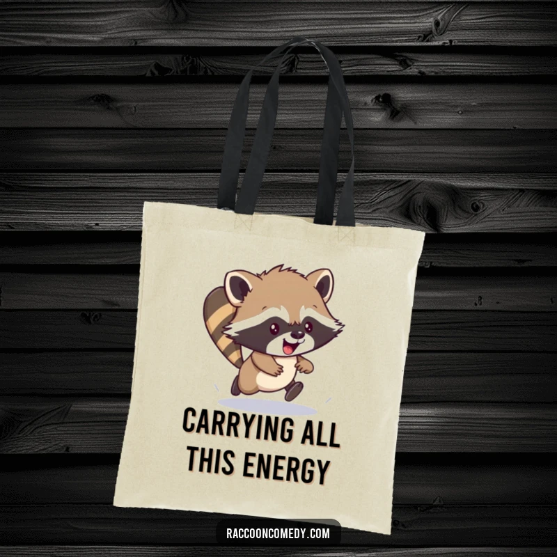Funny tote bag featuring an energetic raccoon cub in a clumsy scamper, perfect for carrying items with a dose of cheerful fun.