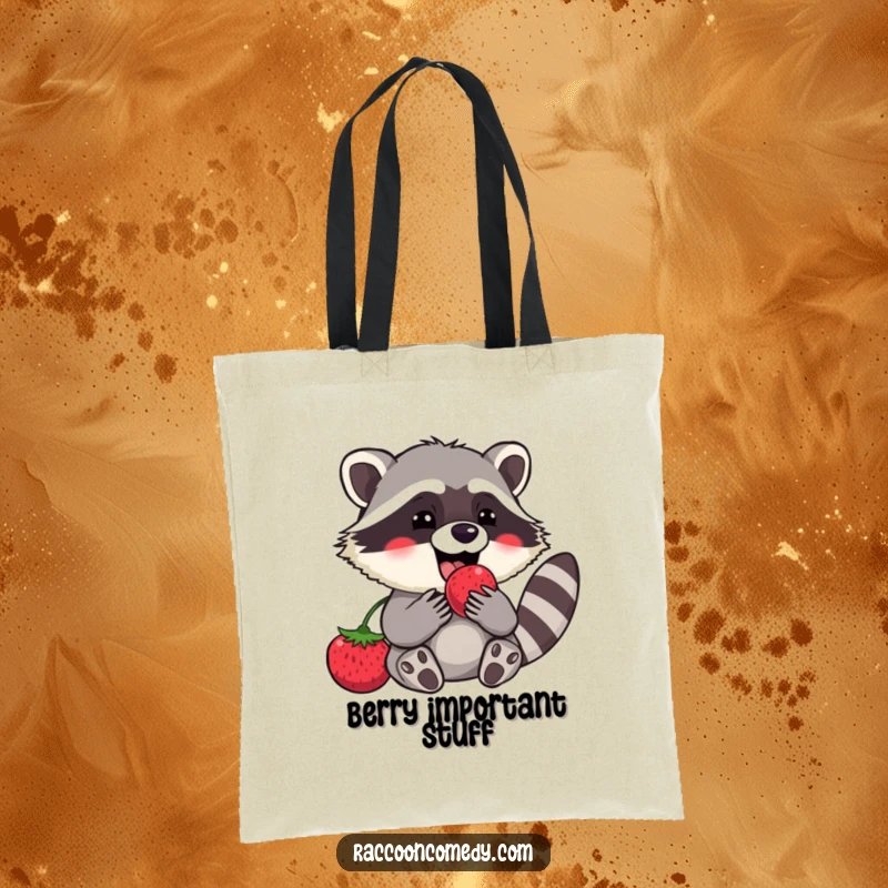 Funny raccoon tote bag depicting a gleeful character celebrating a delicious berry, ready to carry groceries or treasures with a smile.