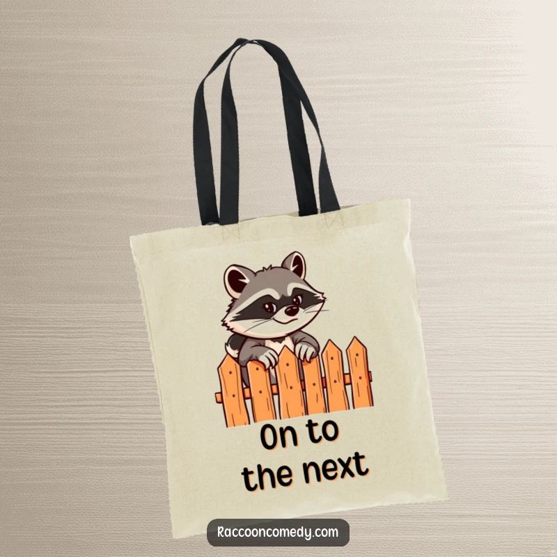 Funny tote bag with a sly raccoon scaling a fence, perfect for carrying items with a dose of playful adventure and humor.